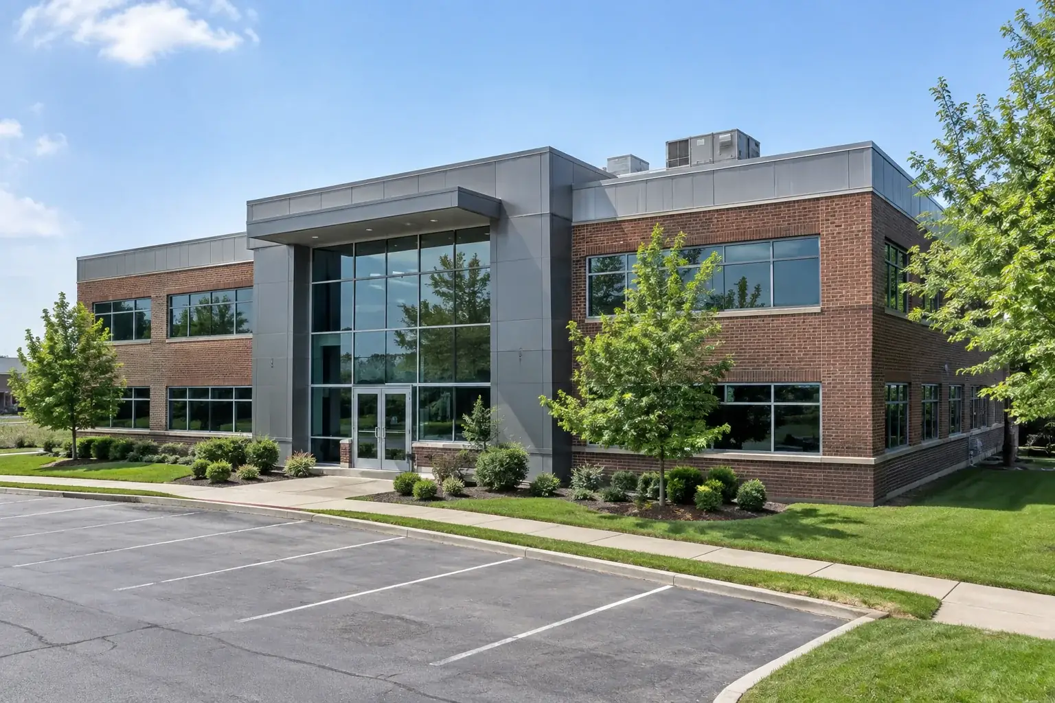 Modern commercial office building with landscaped grounds